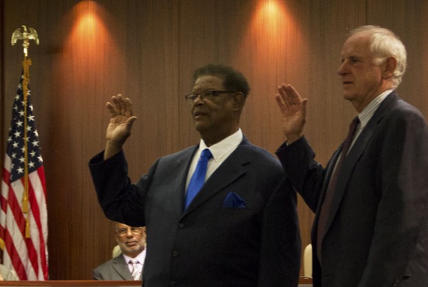 Re-elected Councilmembers Nat Bates and Tom Butt take the oath of office.